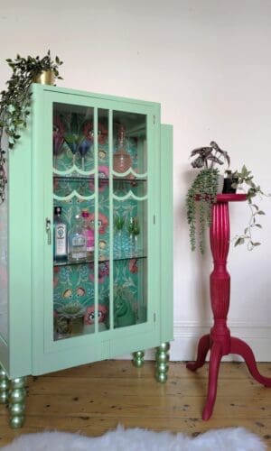 Pistachio Green Glass Display cabinet with red vintage plant stand