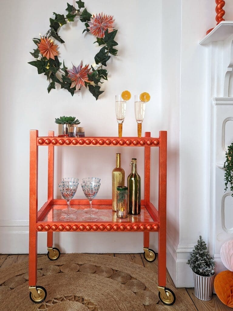 Luxury drinks trolley hand gilded in orange silver leaf