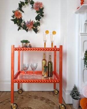 Luxury drinks trolley hand gilded in orange silver leaf