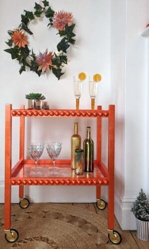 Luxury drinks trolley hand gilded in orange silver leaf