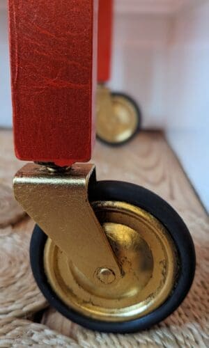 close up of gold gilded trolley wheel