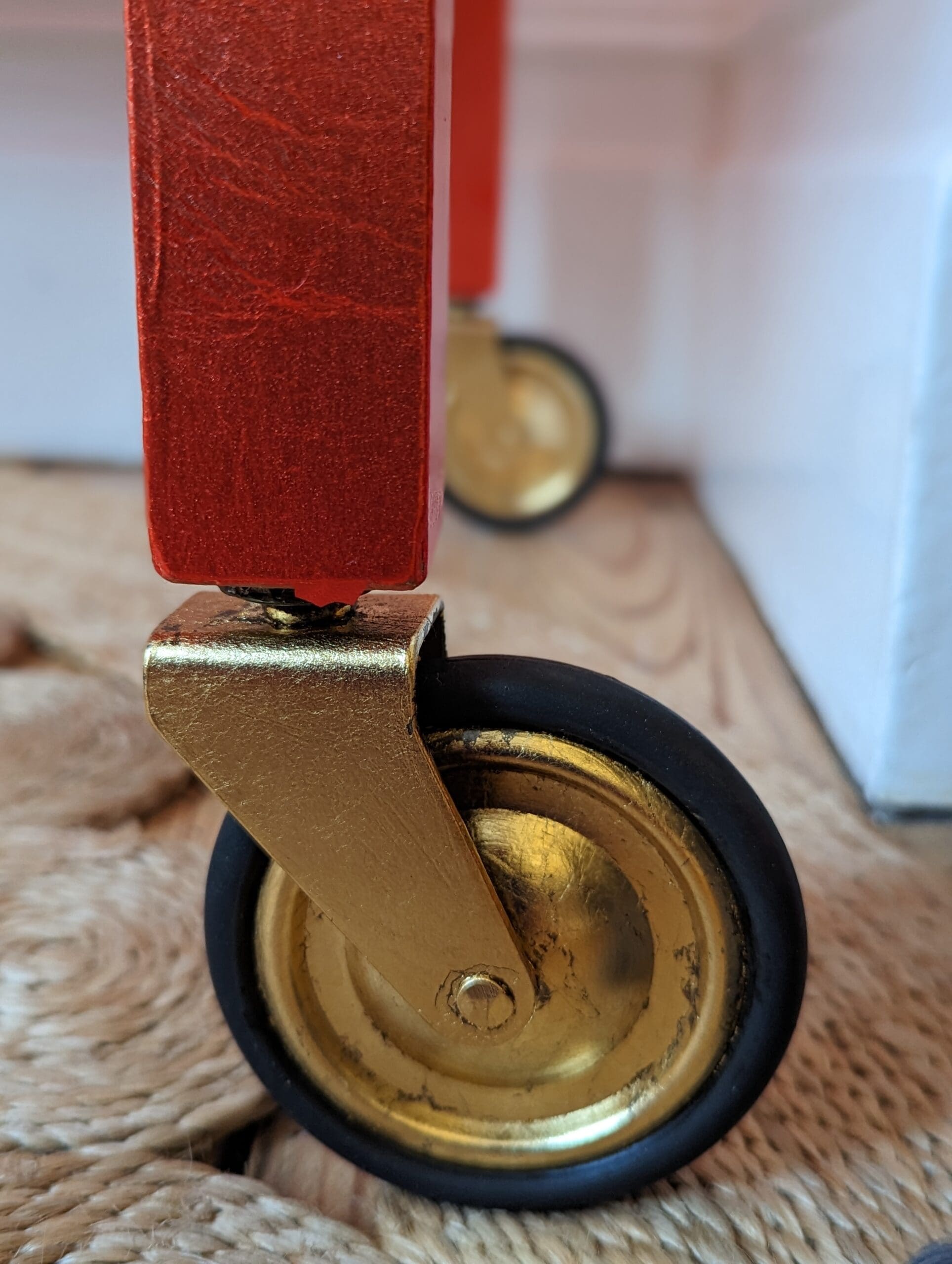 close up of gold gilded trolley wheel