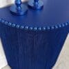 Blue semi circle console table with full length fringing