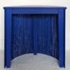 Blue fringed semi circle console table back view
