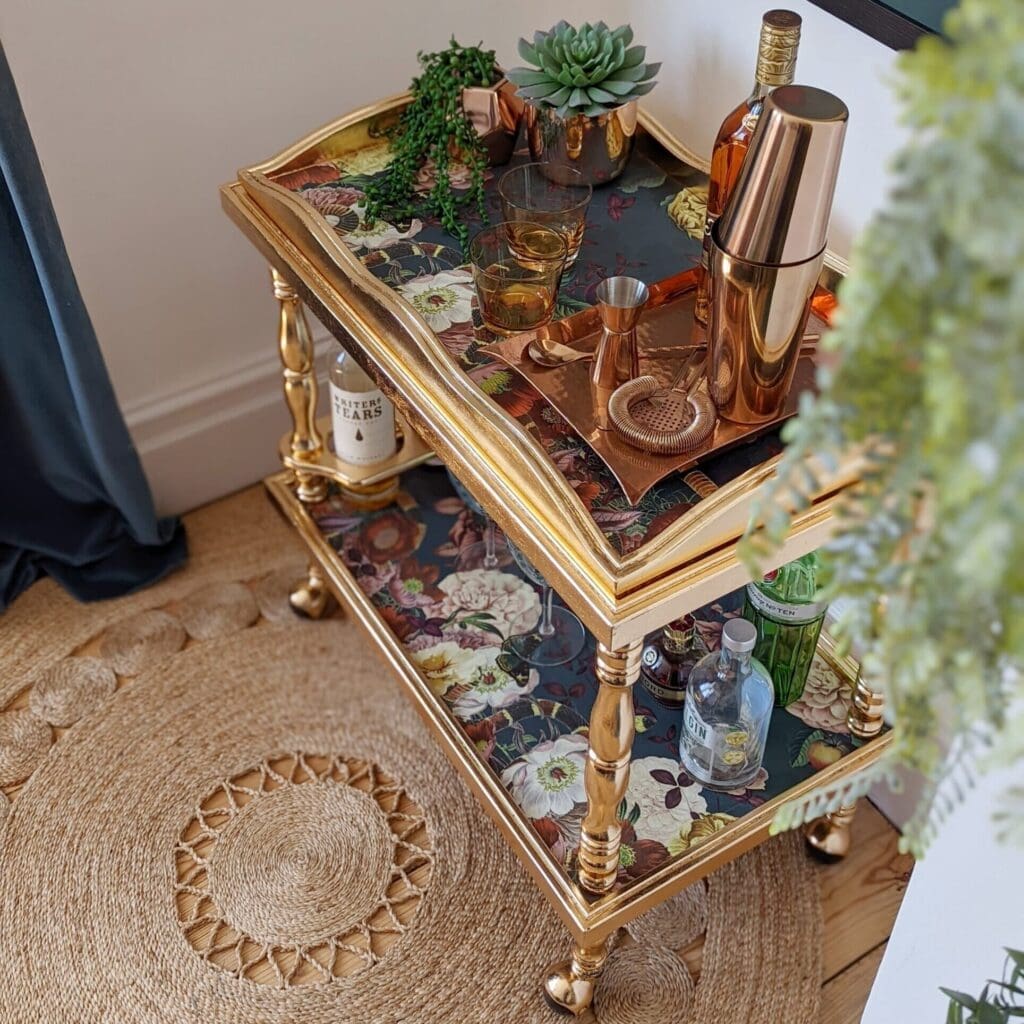 Gold leaf drinks trolley in a sustainable luxury interior