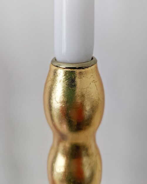 Top of artisan candlestick gilded in genuine gold dyed silver leaf handcarfted from reclaimed table legs