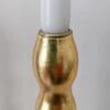 Top of artisan candlestick gilded in genuine gold dyed silver leaf handcarfted from reclaimed table legs