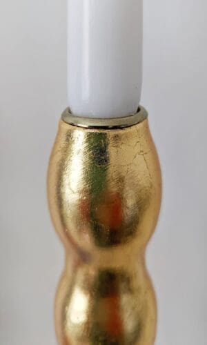 Top of artisan candlestick gilded in genuine gold dyed silver leaf handcarfted from reclaimed table legs
