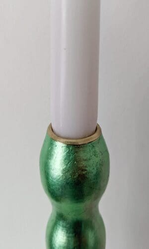 Top of artisan candlestick gilded in genuine mint green dyed silver leaf handcarfted from reclaimed table legs