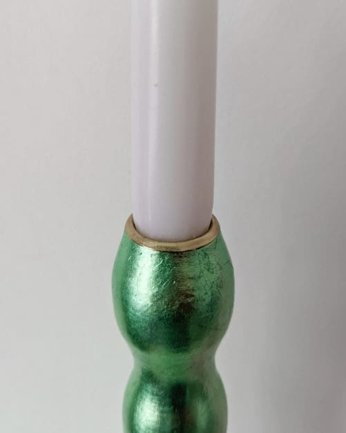 Top of artisan candlestick gilded in genuine mint green dyed silver leaf handcarfted from reclaimed table legs