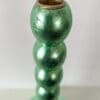 Top view of metallic green handcrafted candlestick