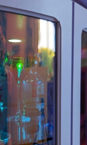 Close up of iridescent curved glass door