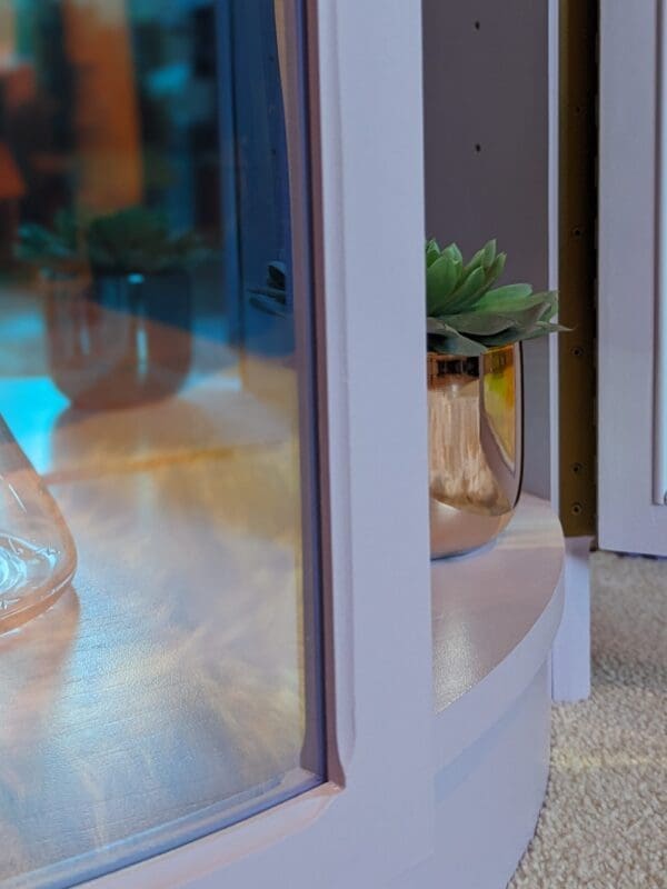 Close up of iridescent curved glass door