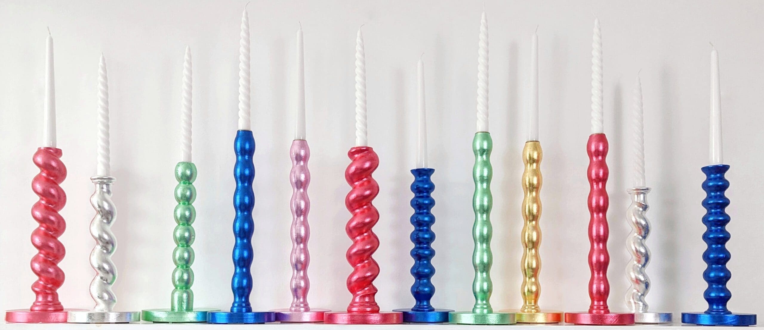 The new Webb & Gray gilded Candlestick Collection.  12 candlesticks in Scarlet, Genuine Silver, Mint Green, Royal Blue, Candy Pink and Golden finishes.