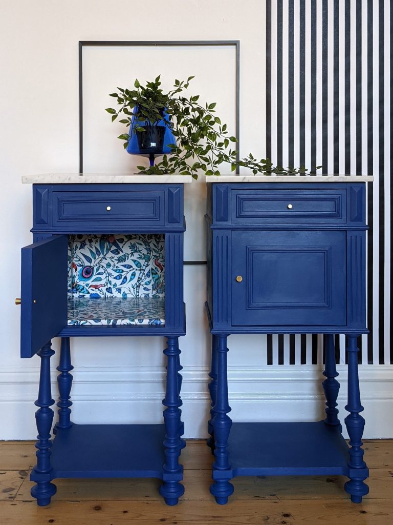 Napoleon and Josephine - blue antique cabinets with botanical wallpaper lining
