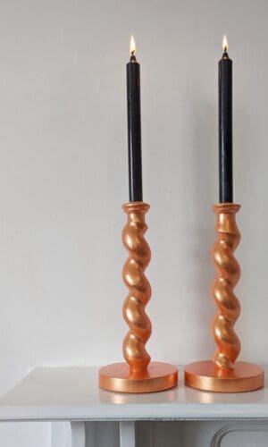 peach candlesticks with black candles