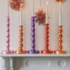 metallic candlesticks in a range of colours
