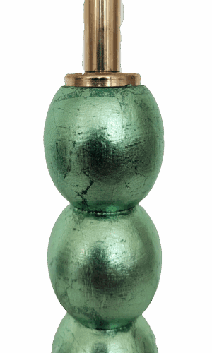 Detail of genuine mint green dyed silver leaf on handcrafted wooden lamp base