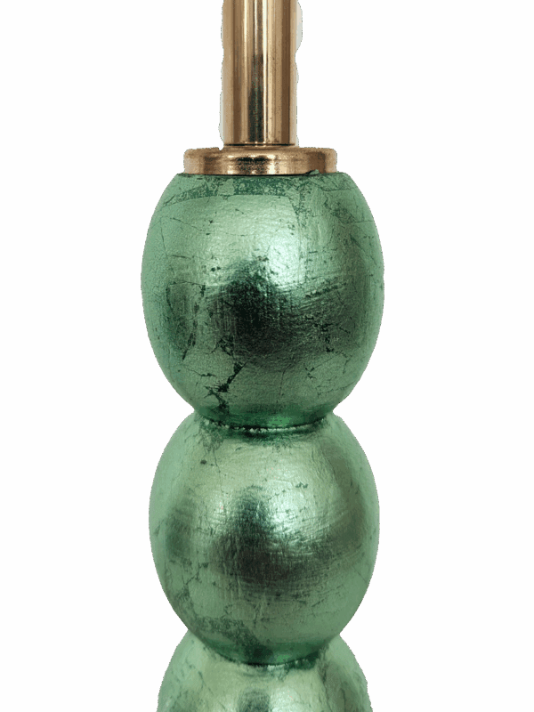 Detail of genuine mint green dyed silver leaf on handcrafted wooden lamp base