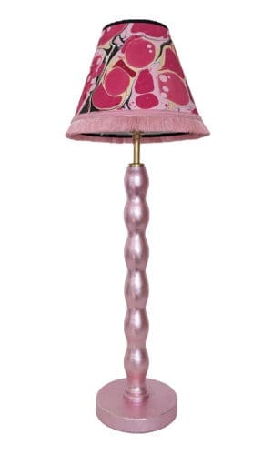 Pale pink cordless lamp gilded in real silver shown with pink marbled lampshade