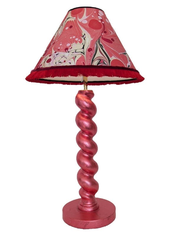 Handmade red cordless lamp made from reclaimed wood shown with red and gold marbled lampshade