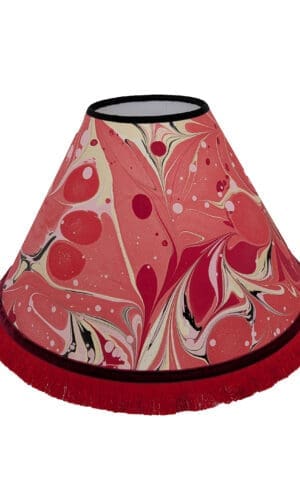 Handmade red and gold marbled lampshade with red fringe and ribbon trim