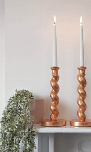 gilded barley twist candlesticks in peach silver leaf