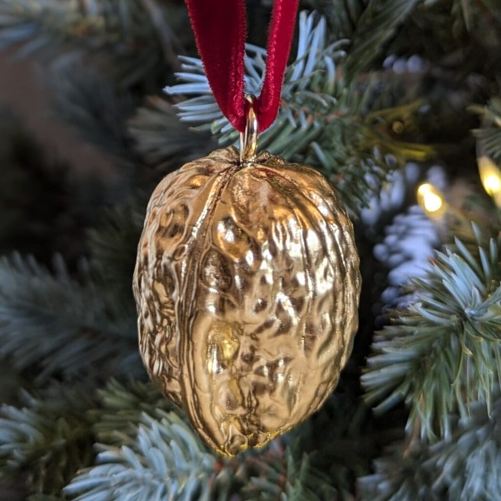 gilded walnut decoration on a christmas tree