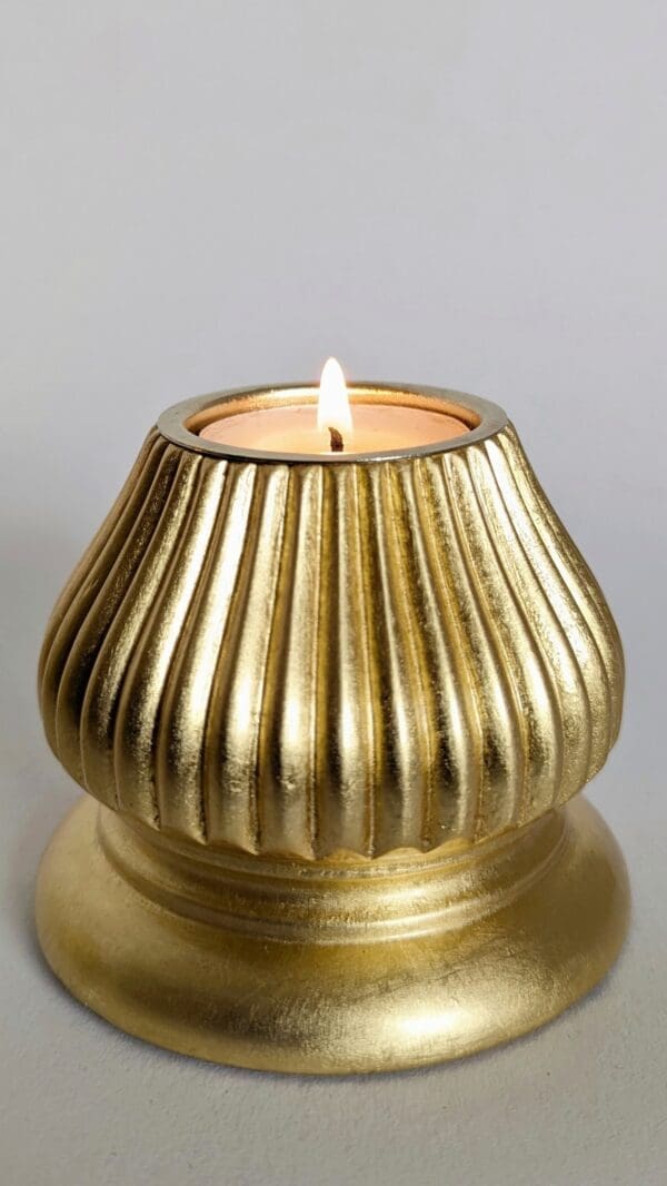 gold tea light candle holder with fluted design