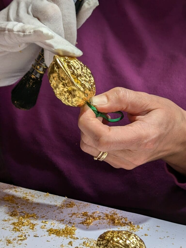 PXL_20241028_094657409 Gilding a walnut at a walnut gilding workshop in Margate