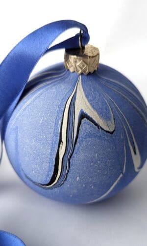 Blue marbled Christmas Bauble with blue ribbon