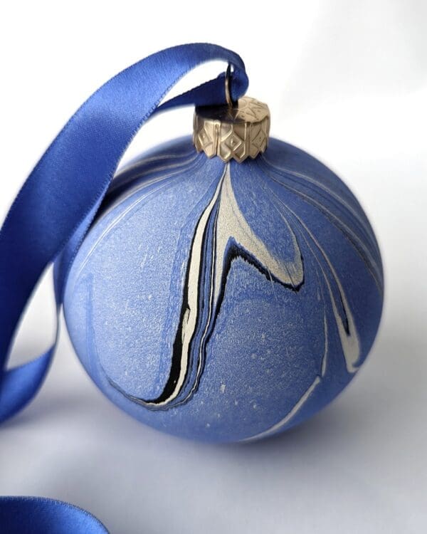 Blue marbled Christmas Bauble with blue ribbon