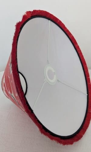 Inside view of red marbled paper lampshade showing sustainable cardboard lining