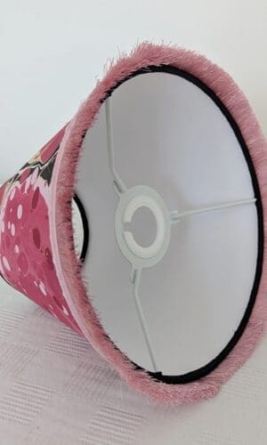 Inside of handmade marbled paper lampshade showing cardboard backing