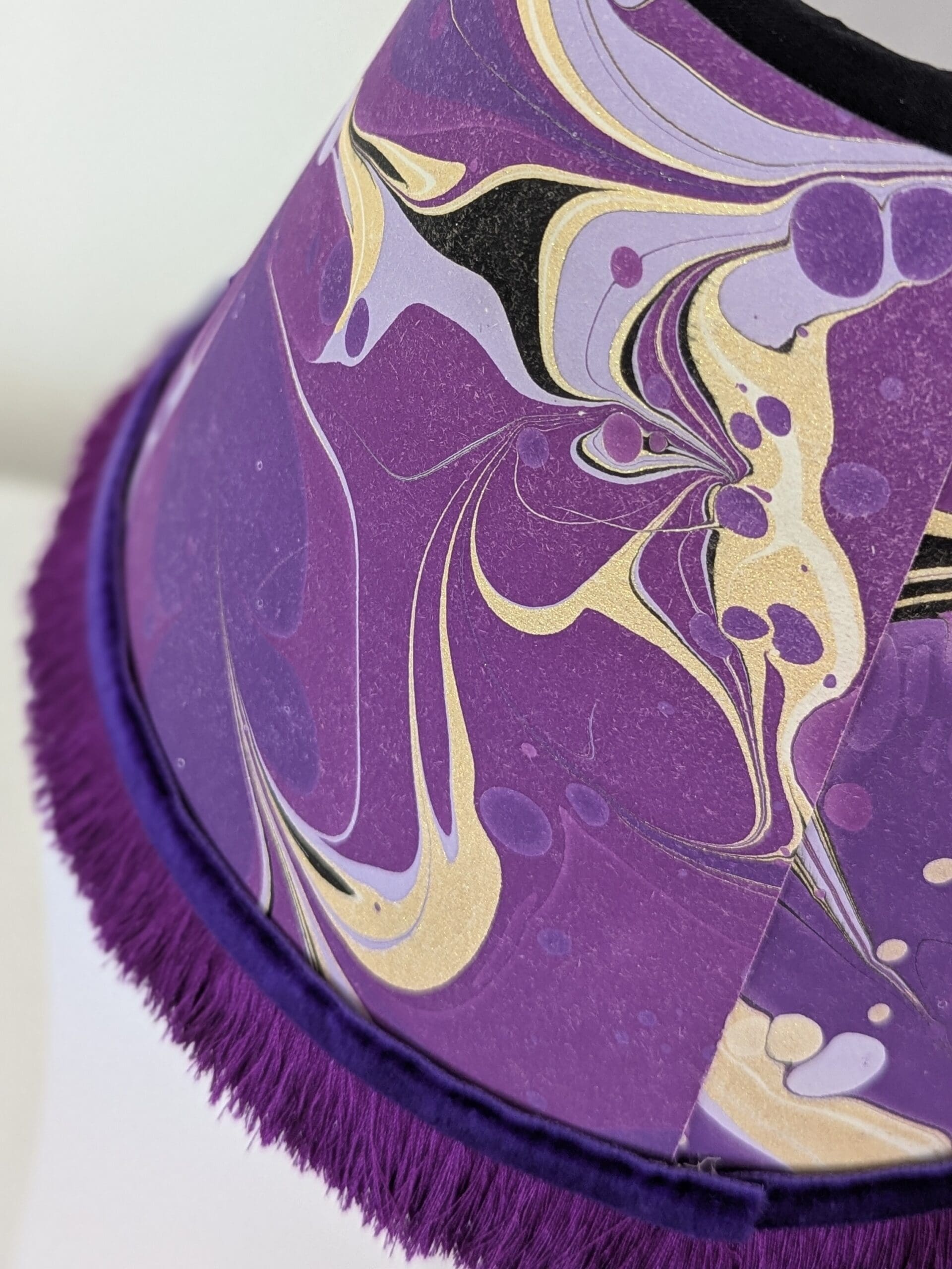 closeup of handmade lampshade in purple colourway
