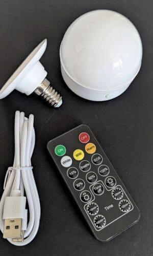 Cordless rechargeable LED lightbulb with charging cable and remote control