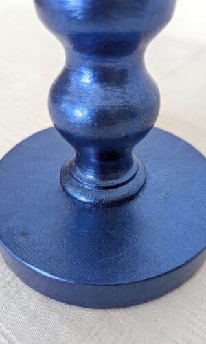 close up of base of blue gilded corless lamp made from reclaimed bobbin chair leg