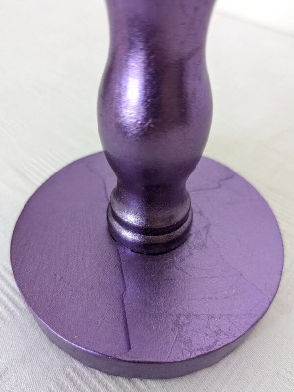 detail of purple cordless lamp showing base gilded in purple silver leaf