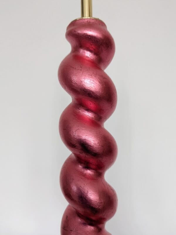 close up of barleytwist cordless lamp gilded in red silver leaf