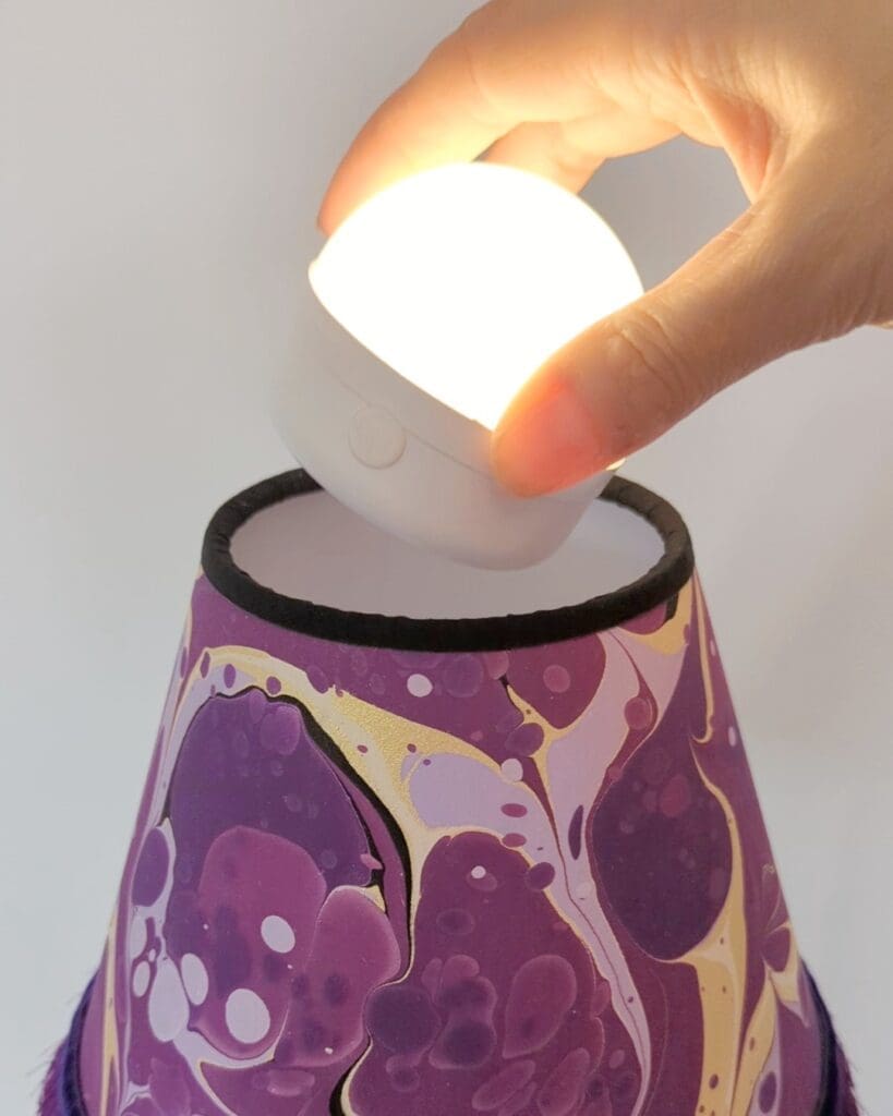 Removing the rechargeable bulb from one of our cordless lamps