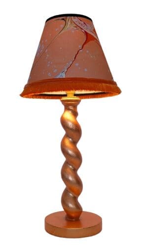 Peach gilded handmade cordless lamp illuminated