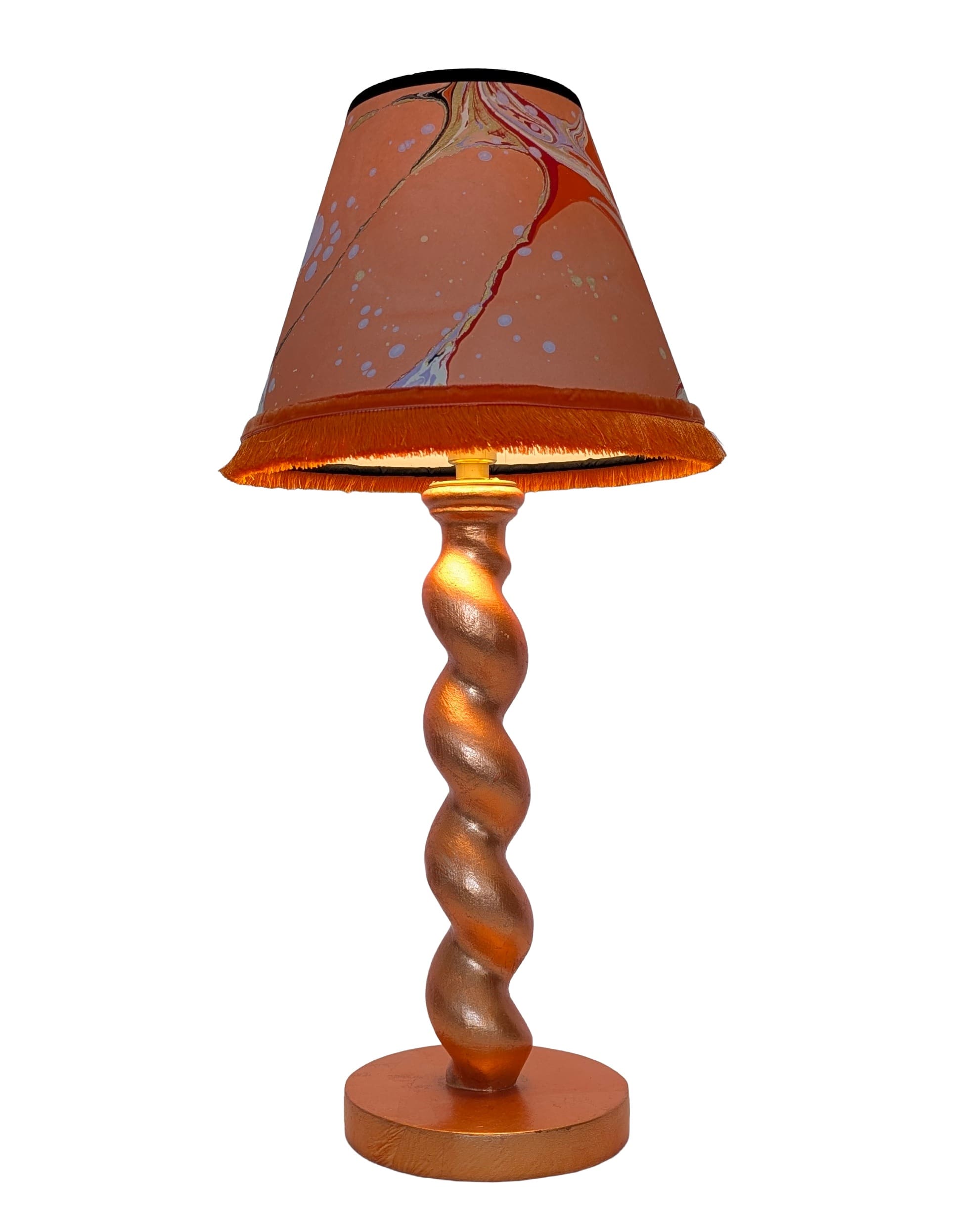 Peach gilded handmade cordless lamp illuminated
