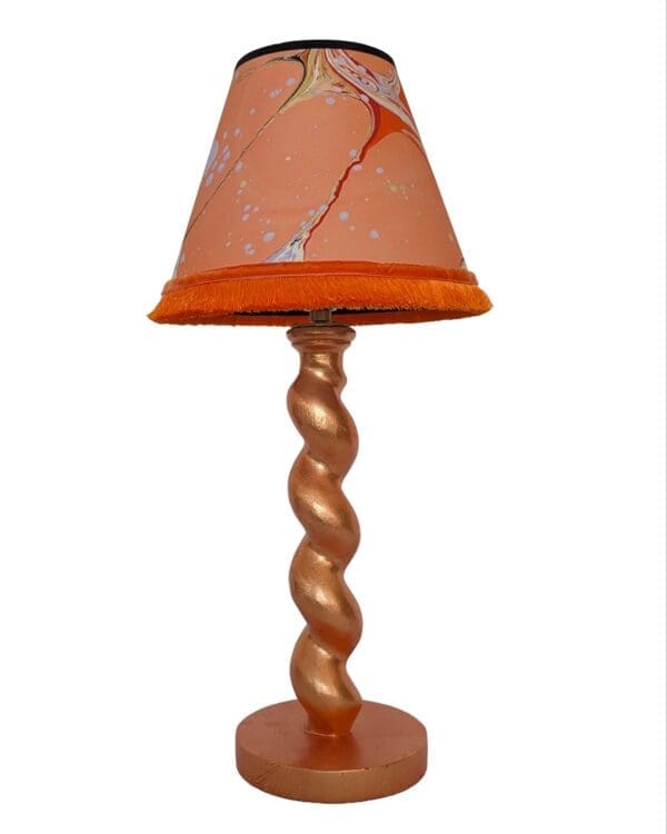 Peach cordless lamp with marbled lampshade