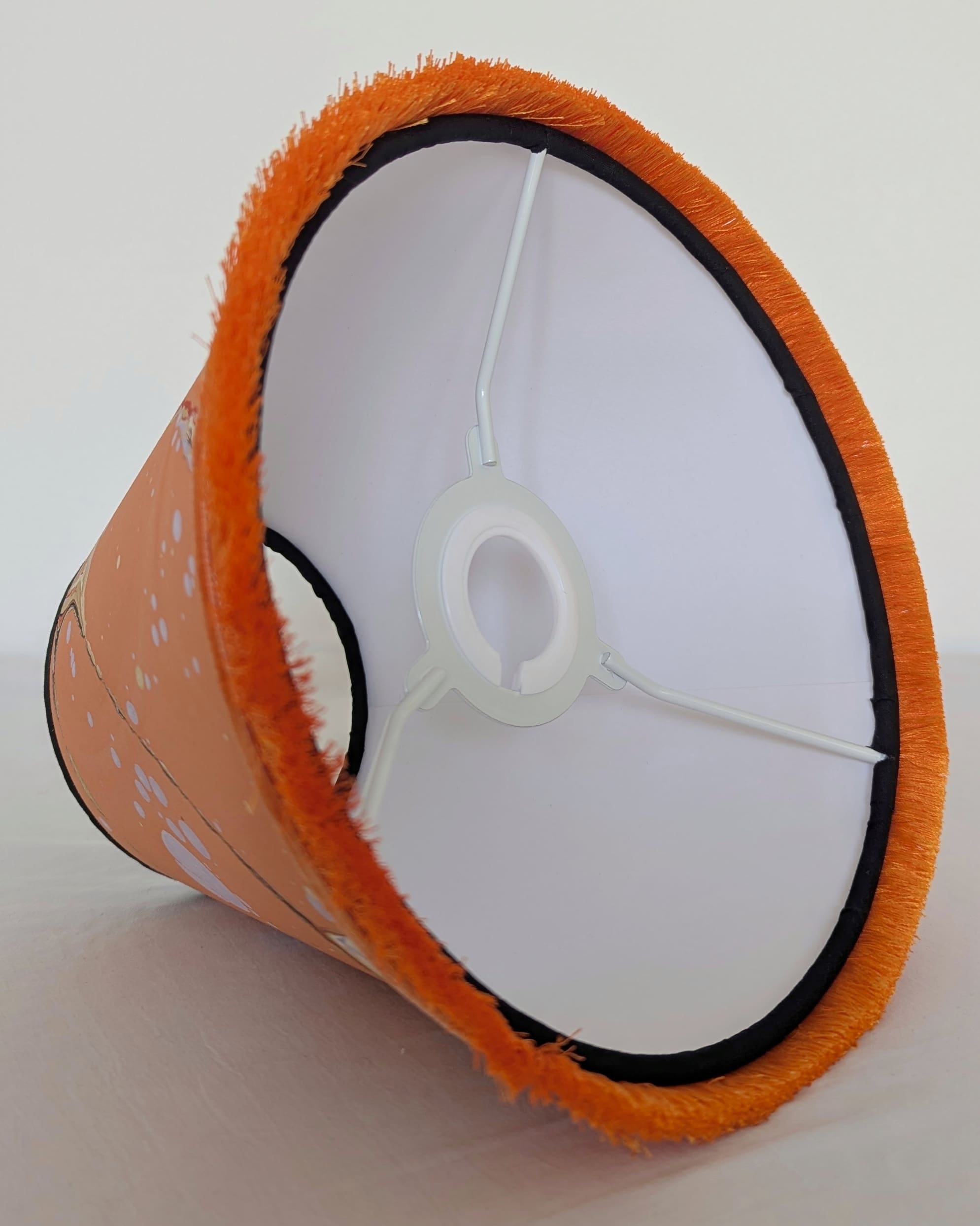 Peach marbled lampshade underside view