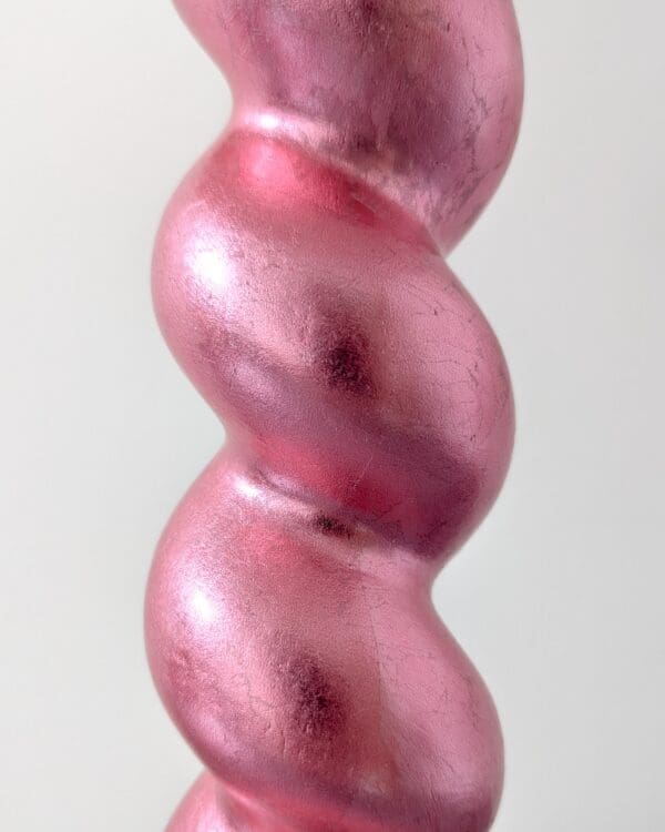 Close up of twist lamp gilded in genuine pink dyed real silver