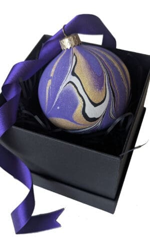 Purple black and gold marbled bauble with purple satin ribbon in black gift box