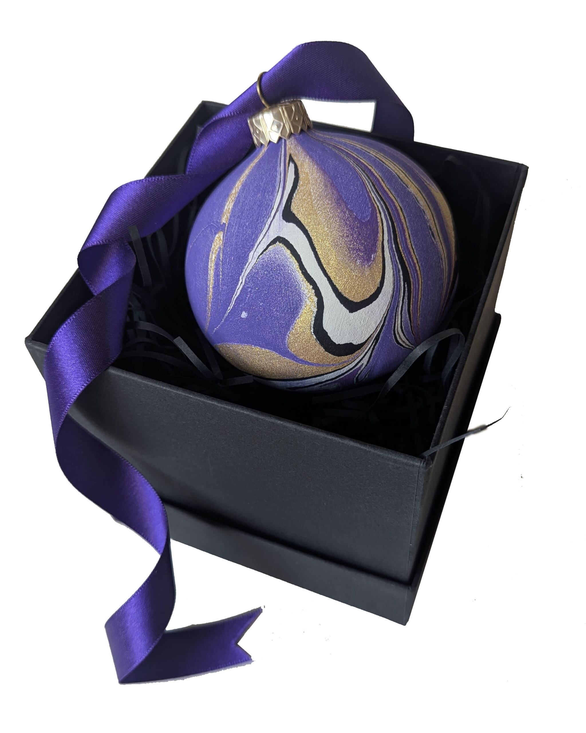 Purple black and gold marbled bauble with purple satin ribbon in black gift box