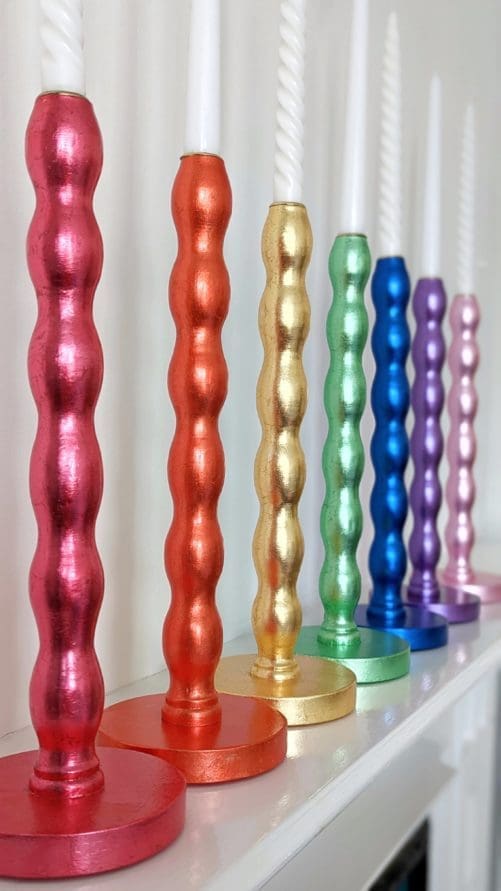 Rainbow of gilded bobbin candleholders
