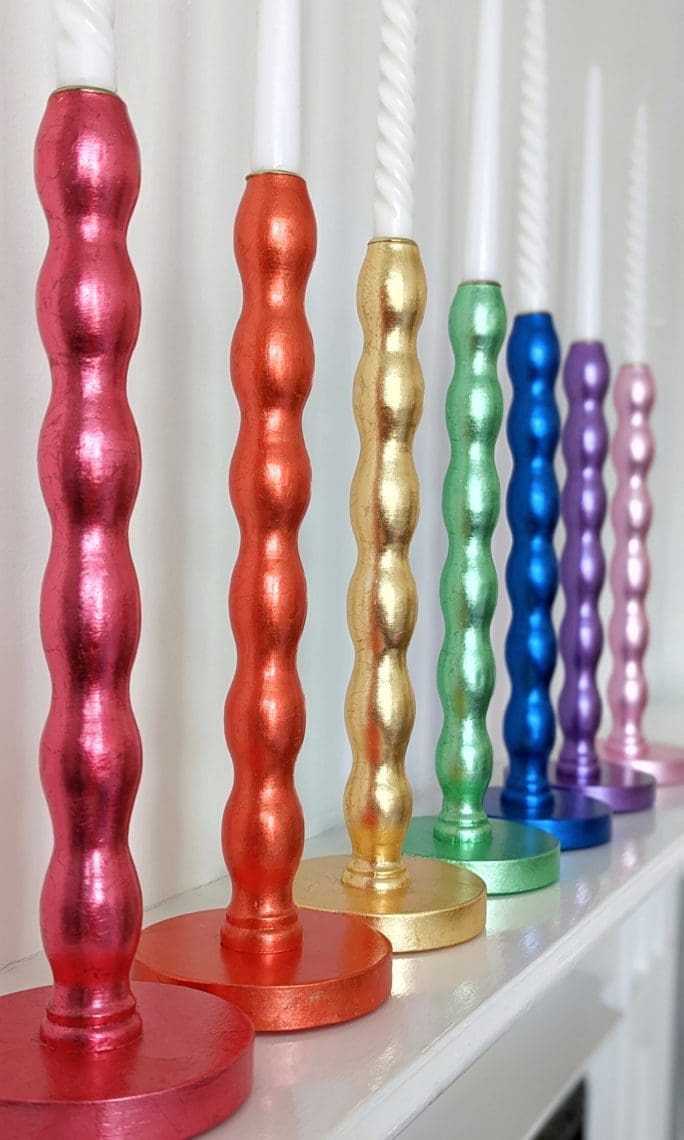 Rainbow of gilded bobbin candleholders