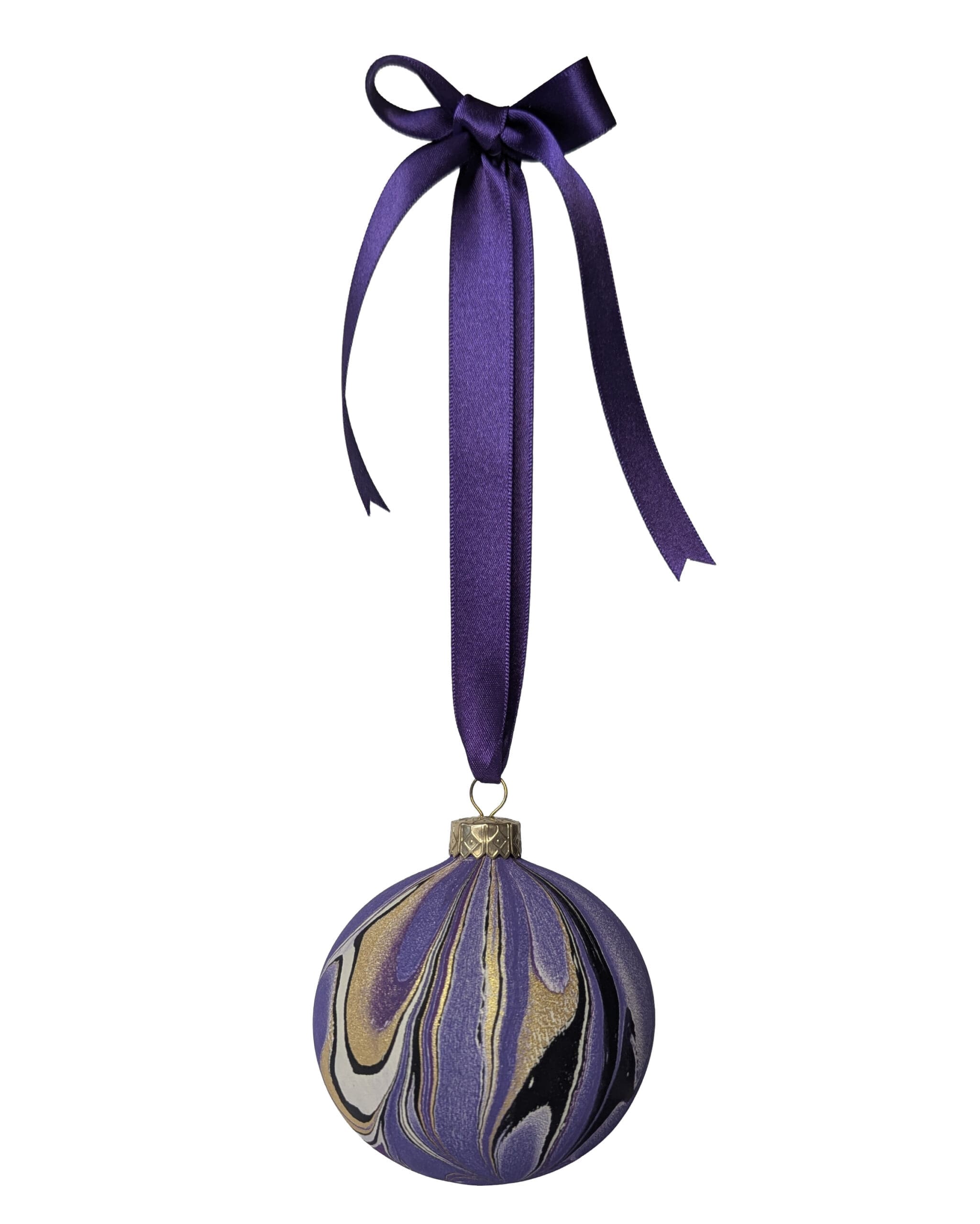 Marbled bauble in purple gold and black with long purple satin ribbon tied in a bow